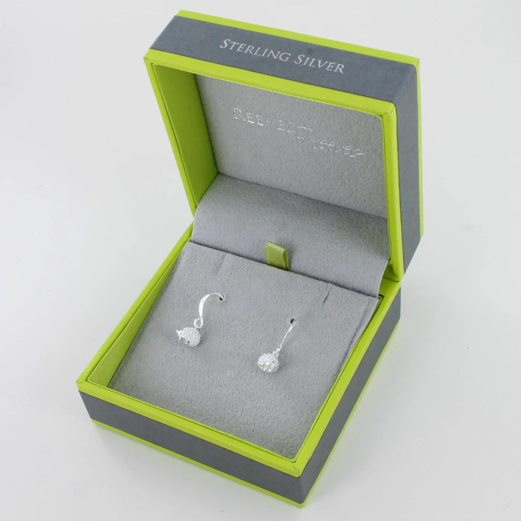 Sterling silver drop earrings with textured spherical charms, presented in a lime green and grey gift box.
