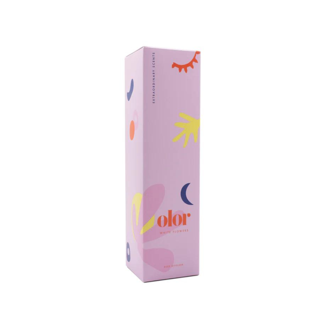 Lavender-colored reed diffuser box with abstract shapes and the word "olor" in orange.