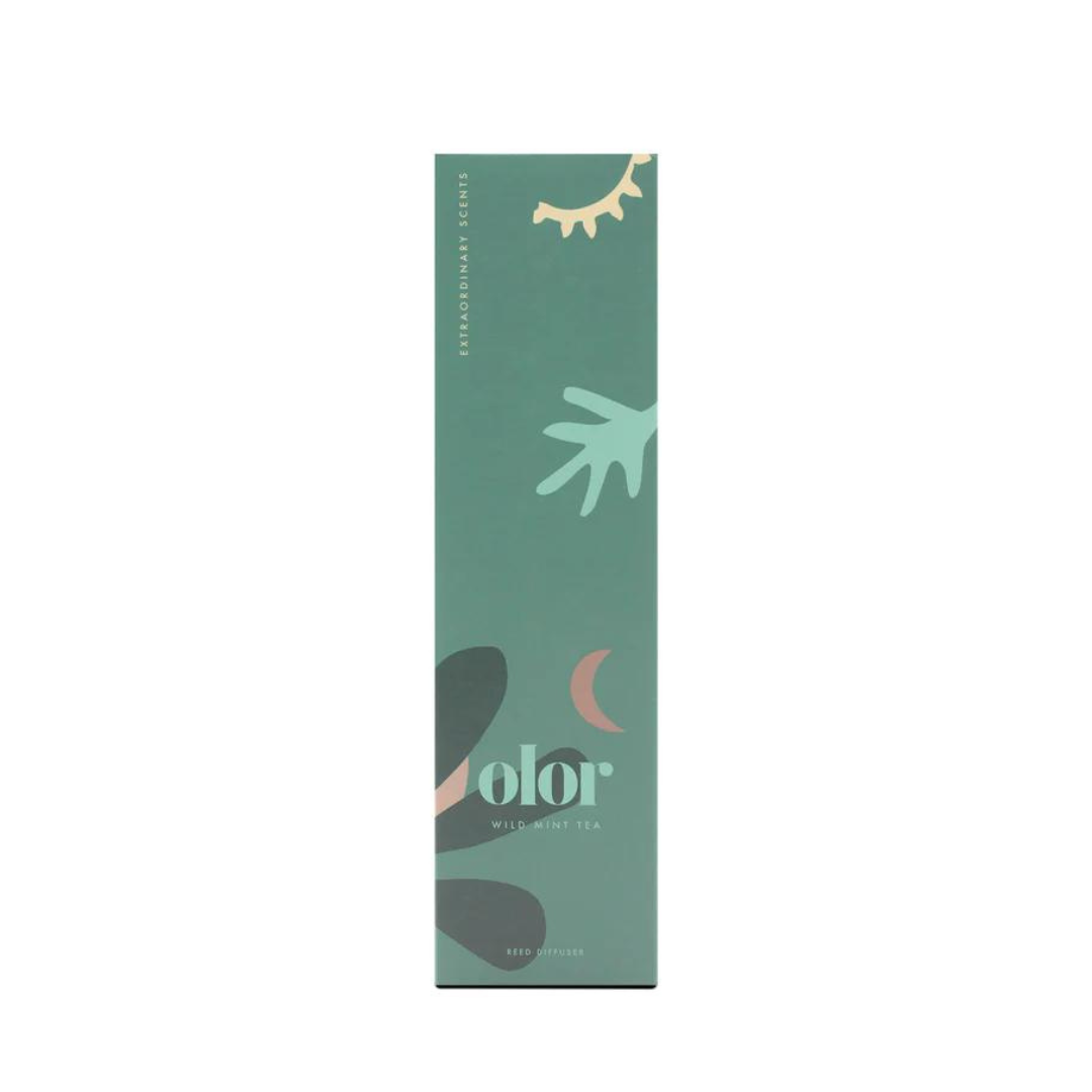 Olor Wild Mint Tea Reed Diffuser.  Teal box with minimalist design featuring abstract shapes and text.