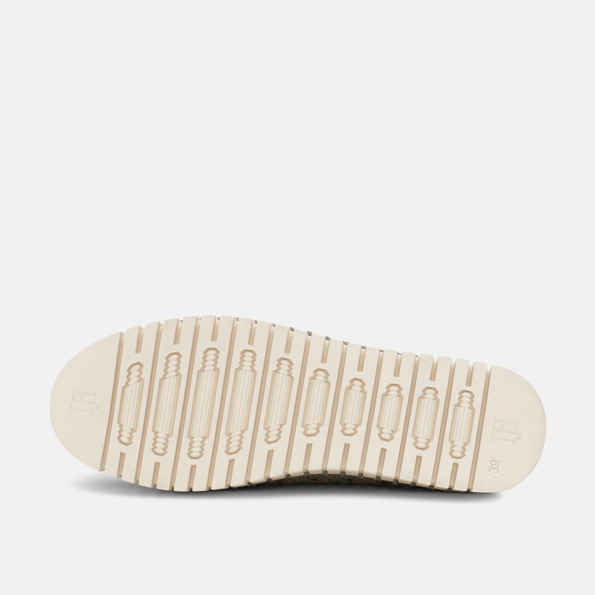 Off-white shoe sole with textured tread, size 39, featuring embossed "TH" logo.