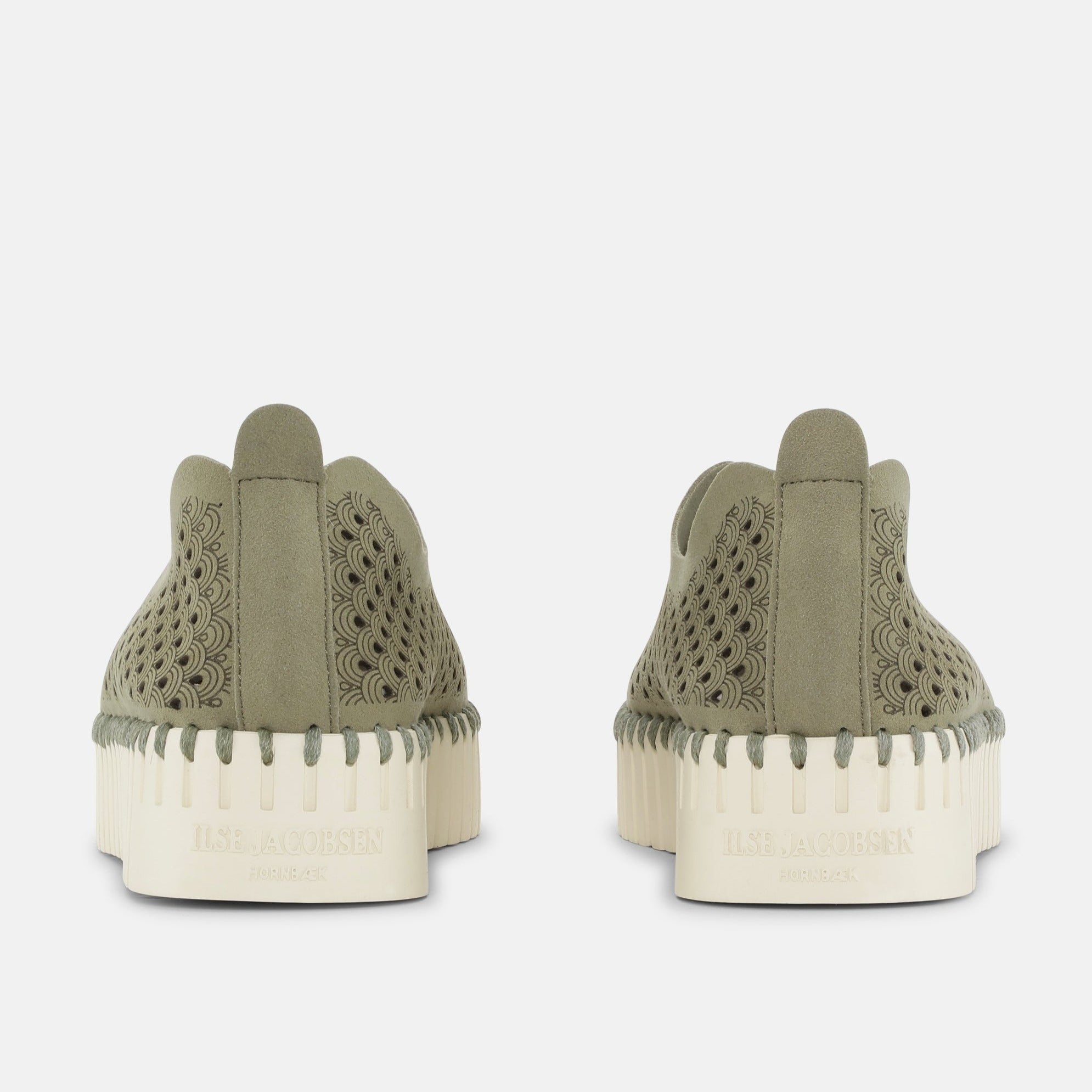 Ilse Jacobsen Hornbæk olive green suede slip-on shoes with laser-cut pattern, cream platform sole, and brand logo on sole.