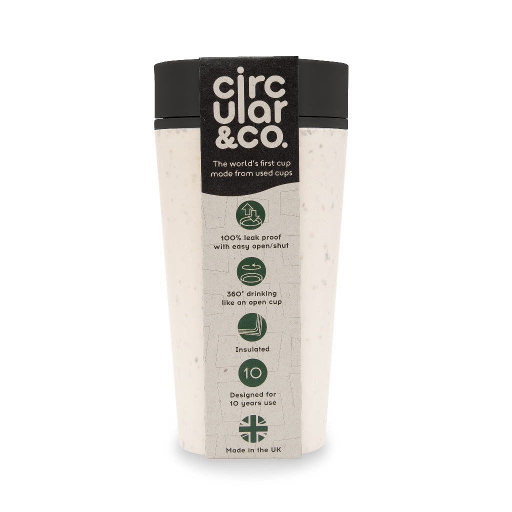 Off-white reusable cup with black lid and base, made from recycled cups; features leak-proof design and 360° drinking.