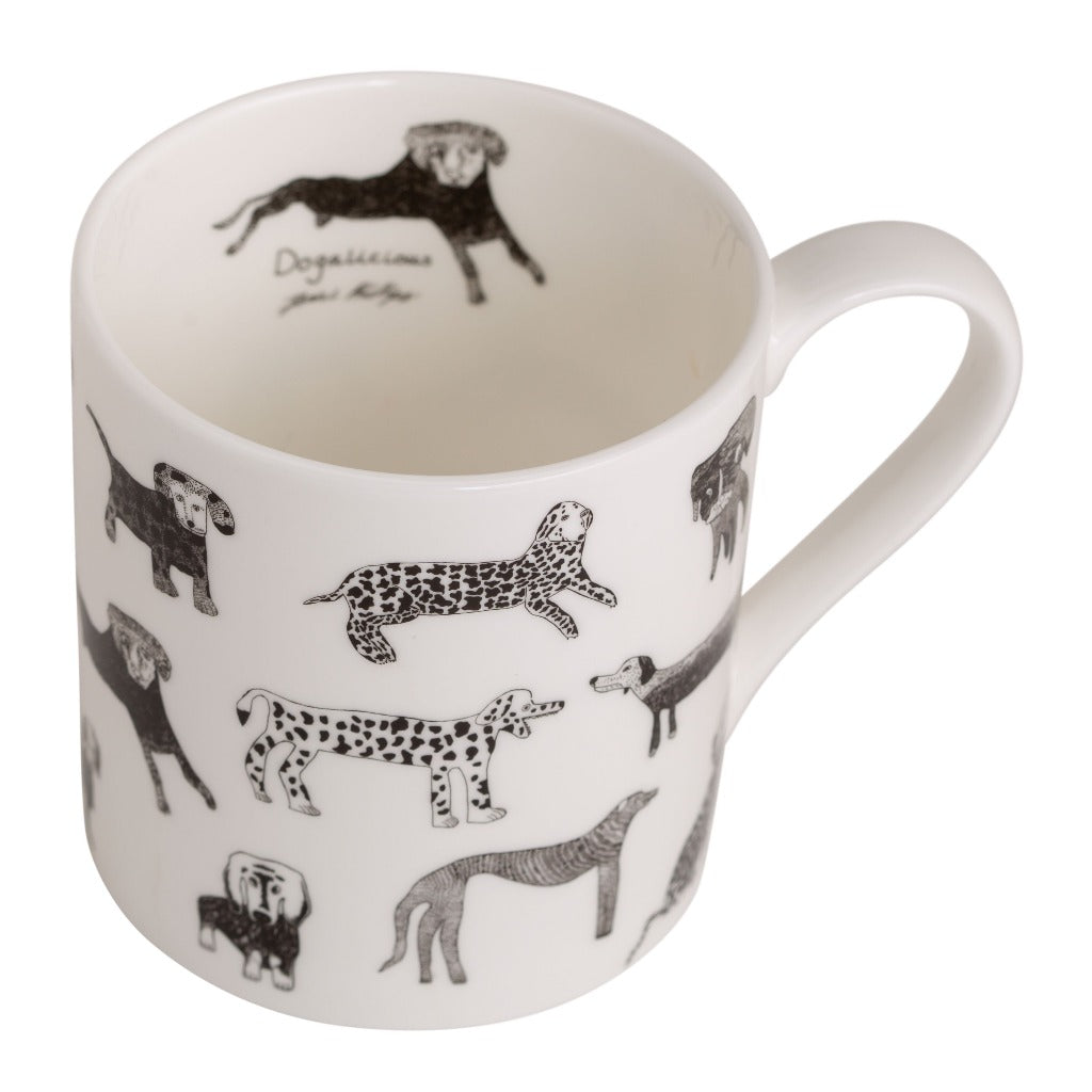 White ceramic mug featuring a pattern of black and white illustrated dogs of various breeds.