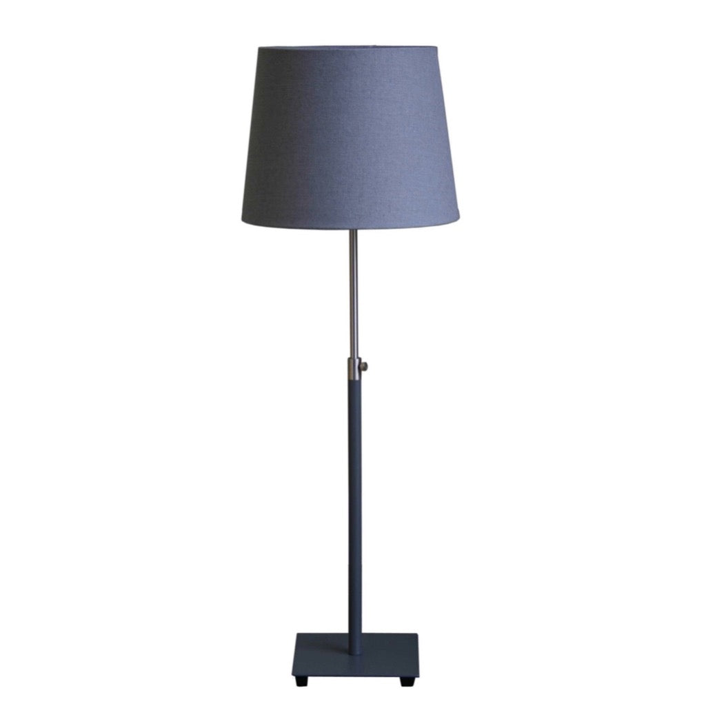 Gray fabric shade floor lamp with a dark gray metal base and stem.