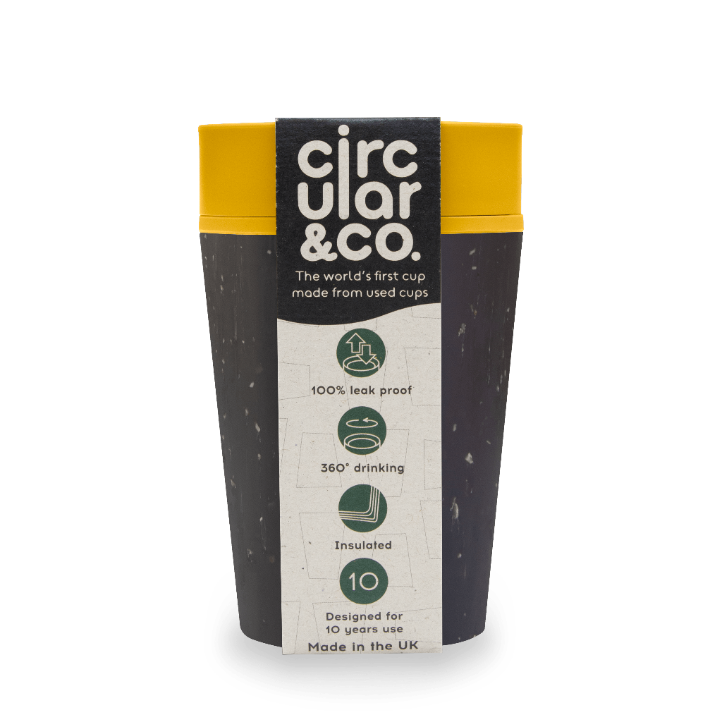 Circular & Co. reusable cup, dark gray with yellow lid, made from recycled cups; leakproof, 360° drinking, insulated.