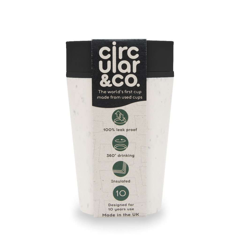 Off-white reusable cup with black lid and base, made from recycled cups; features leak-proof and 360° drinking design;
