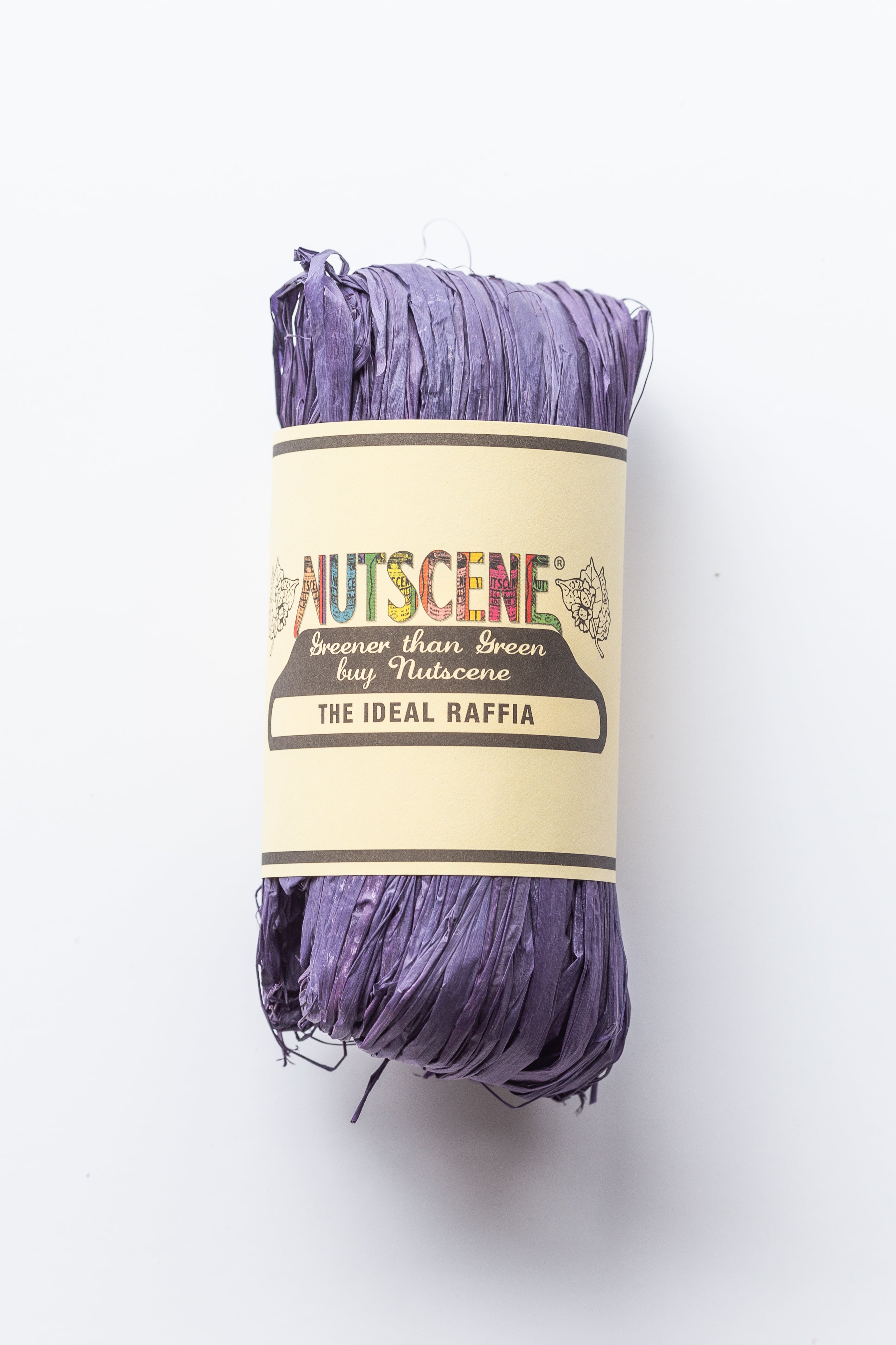 Purple raffia roll by Nutscene.  The label reads "The Ideal Raffia" and "Greener than Green buy Nutscene".