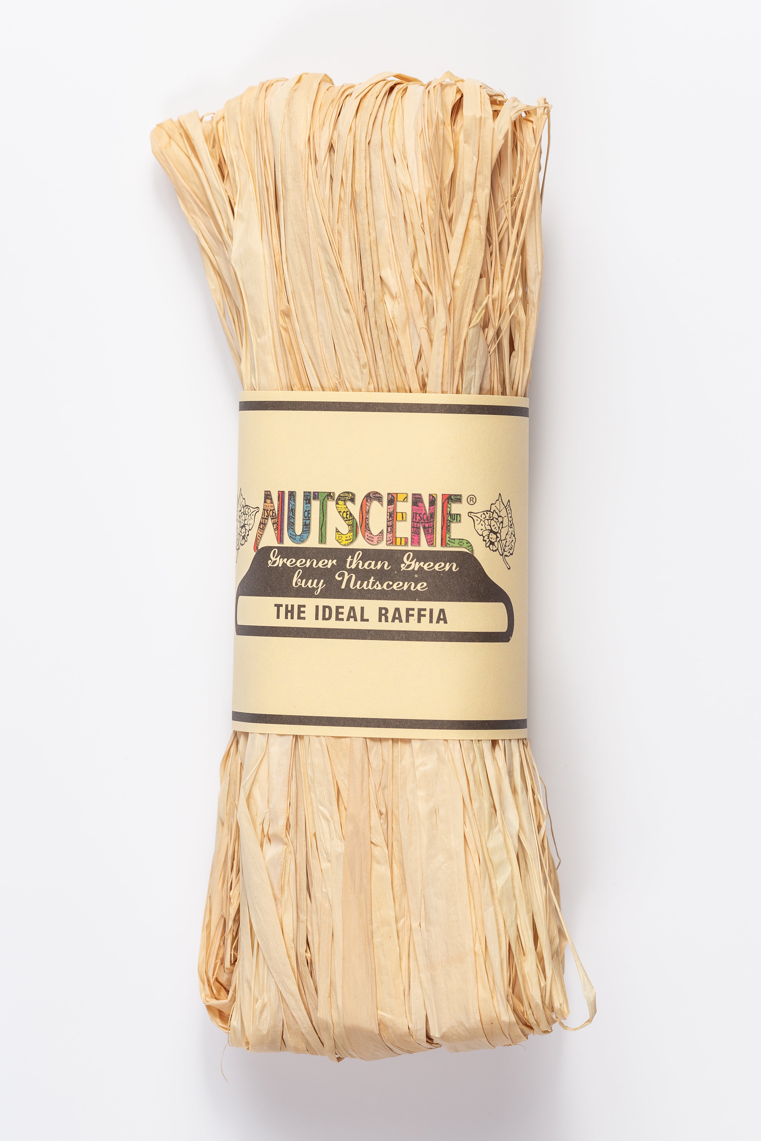 A bundle of light beige raffia, labeled "Nutscene The Ideal Raffia," wrapped in beige paper with colorful lettering.