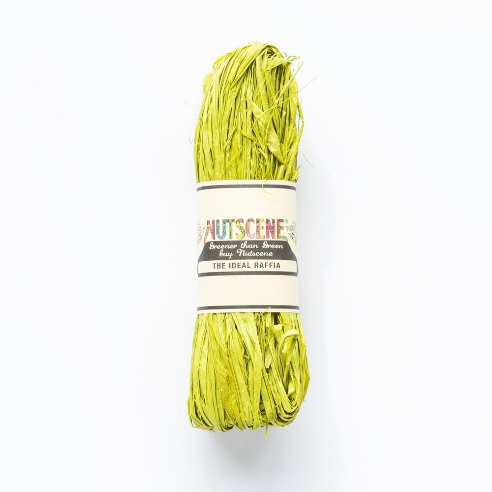 Lime green raffia roll, labeled "Nutscene The Ideal Raffia," on a white background.