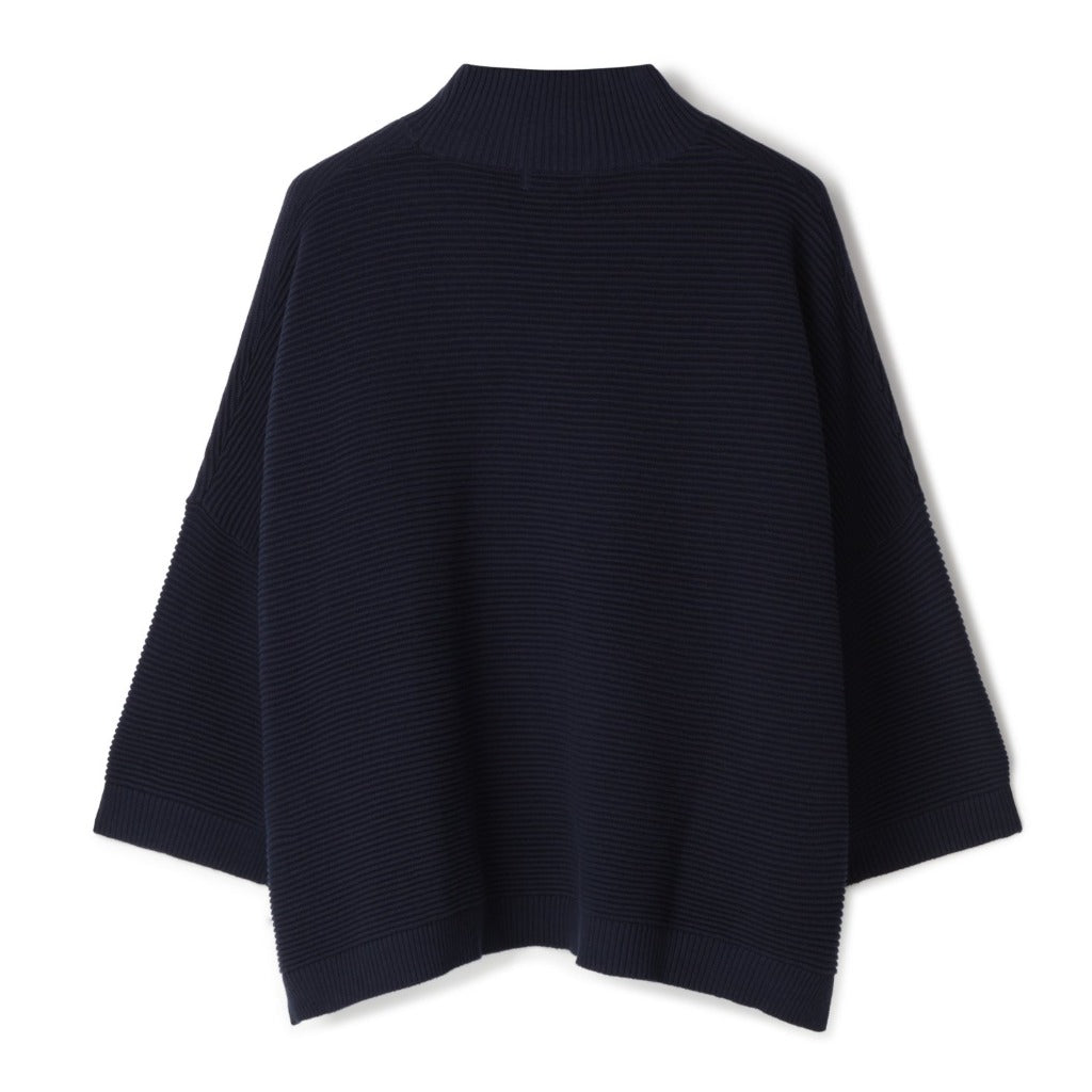Navy blue ribbed knit sweater with a high mock neck and three-quarter sleeves.