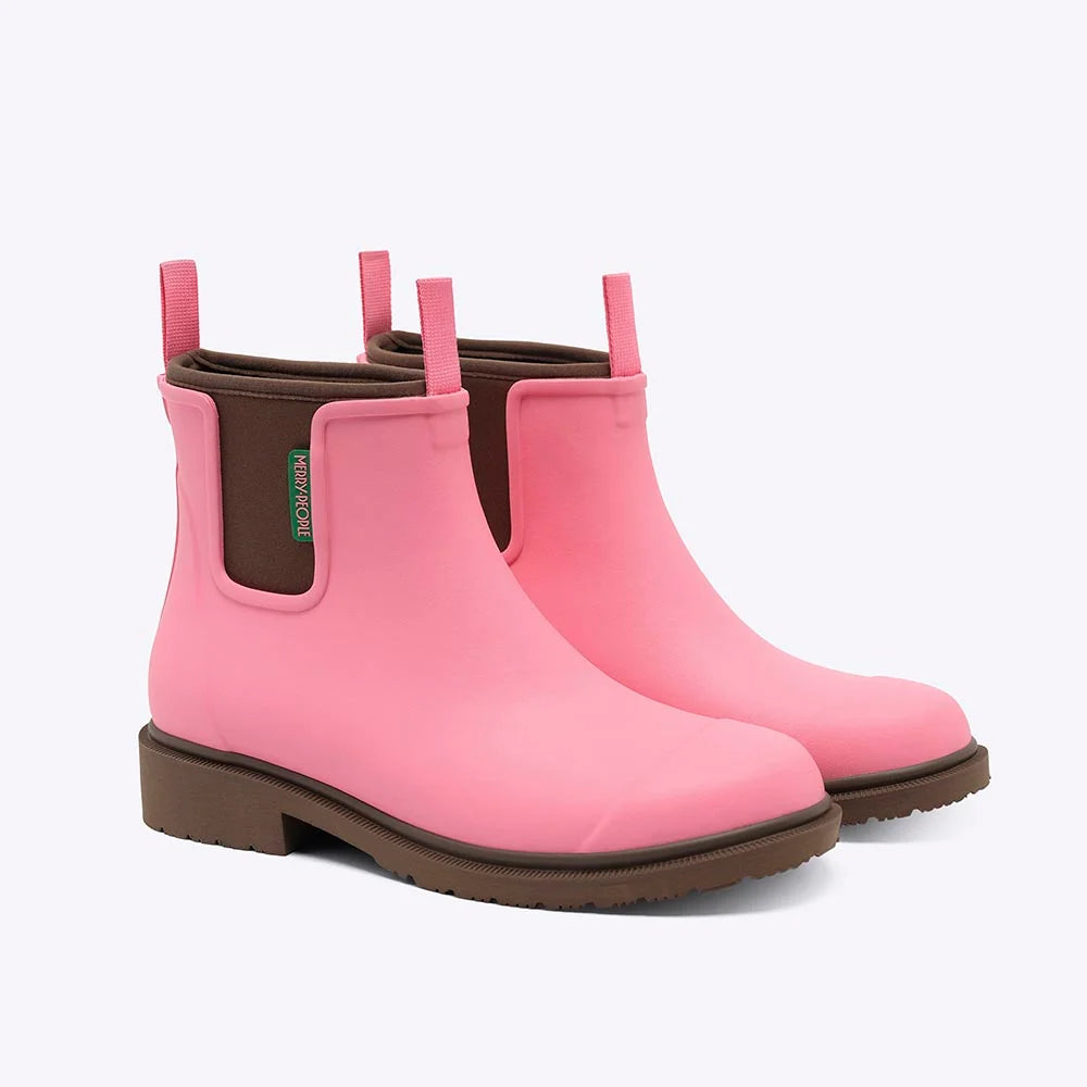 A pair of pink Chelsea-style rain boots with brown soles and elastic side gore, shown on a clean white background.