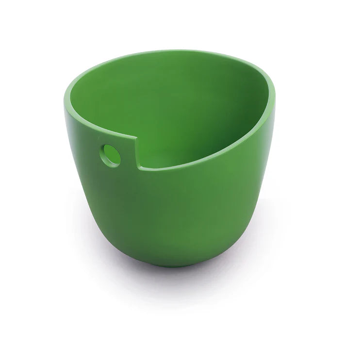 Green bowl with a cutout handle.