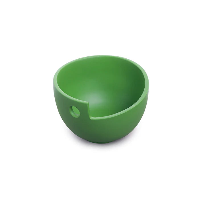Green yarn bowl with a cutout for easy yarn access.