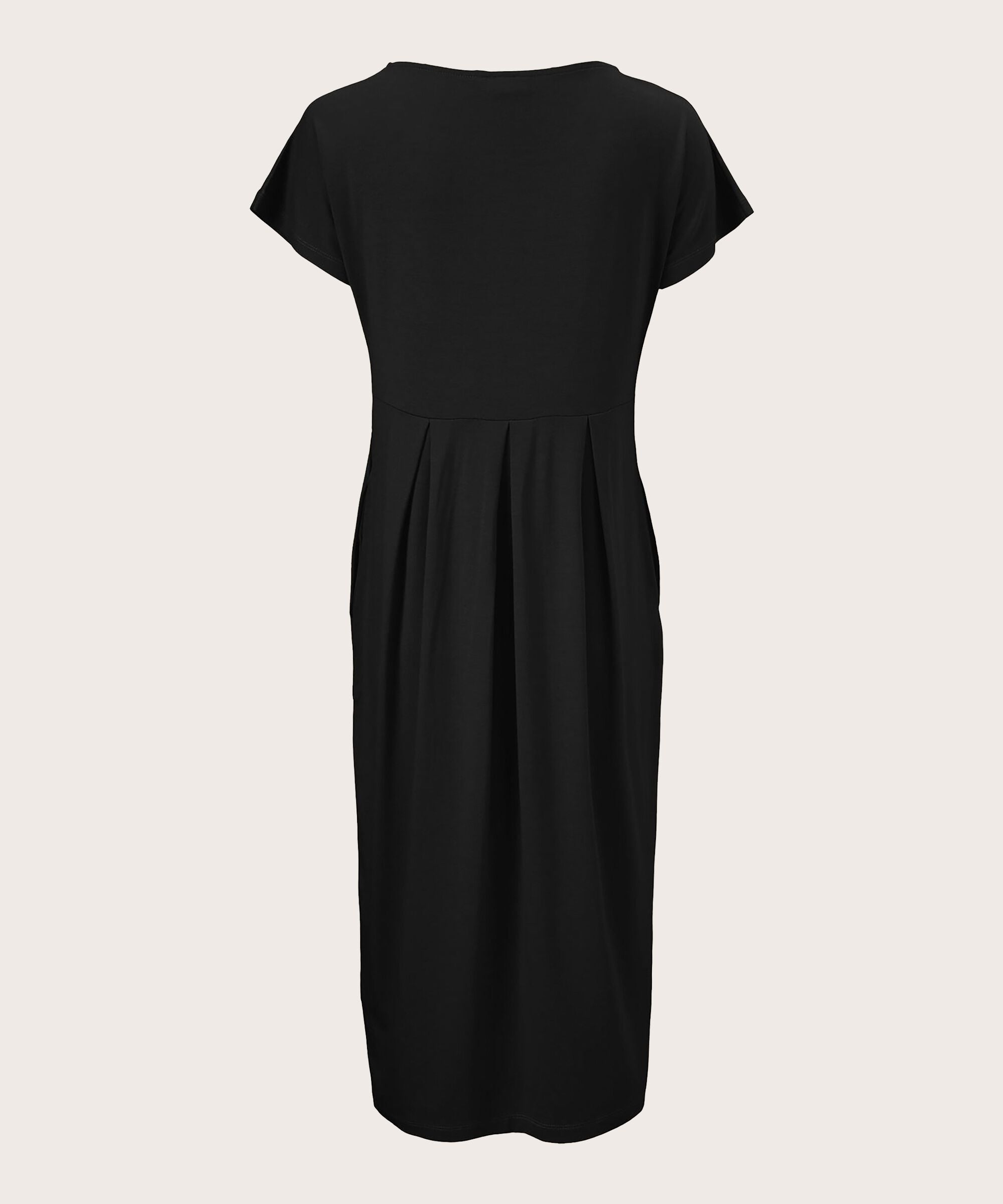 Black dress on a light beige background