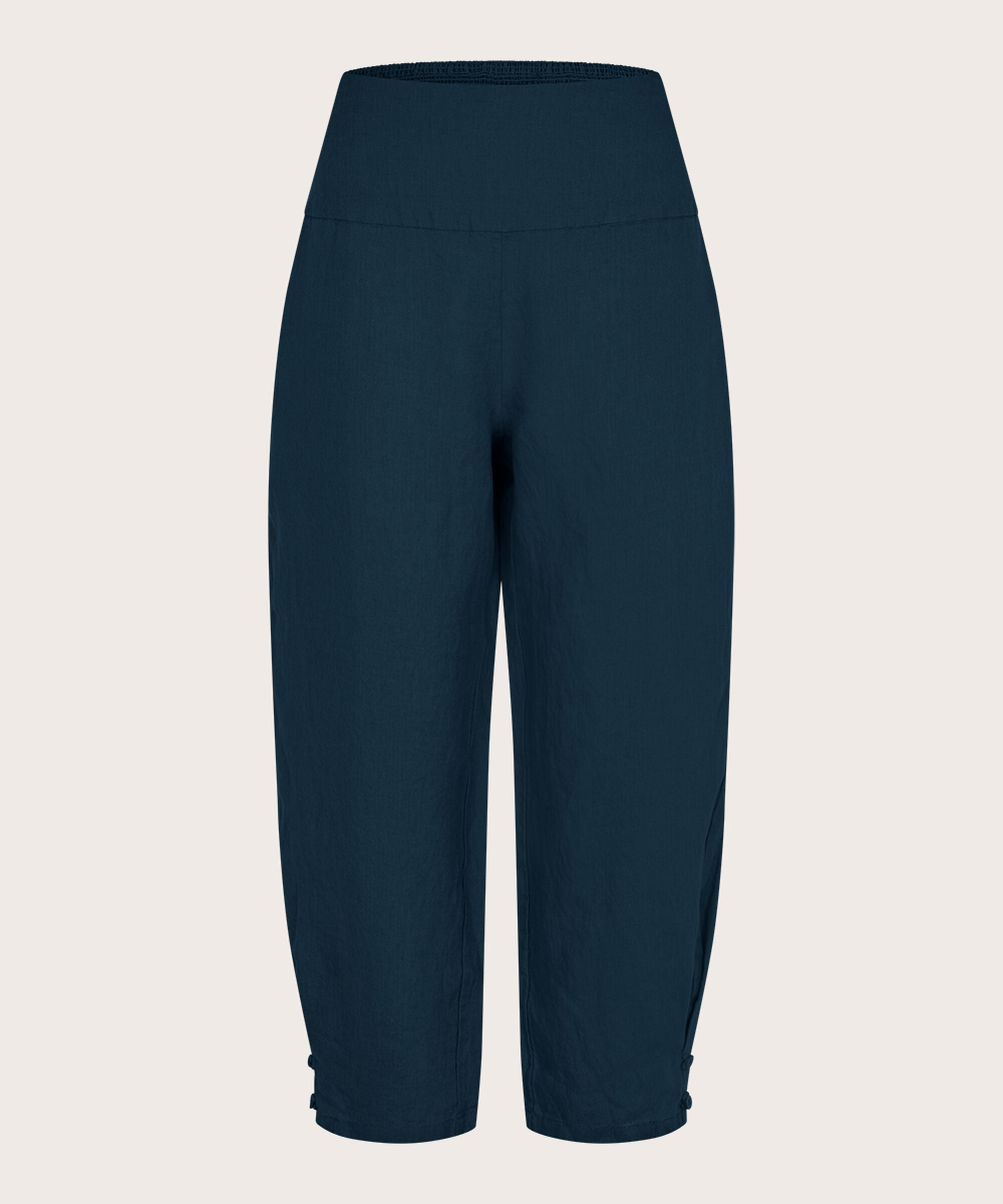 Navy blue pants on a light beige background