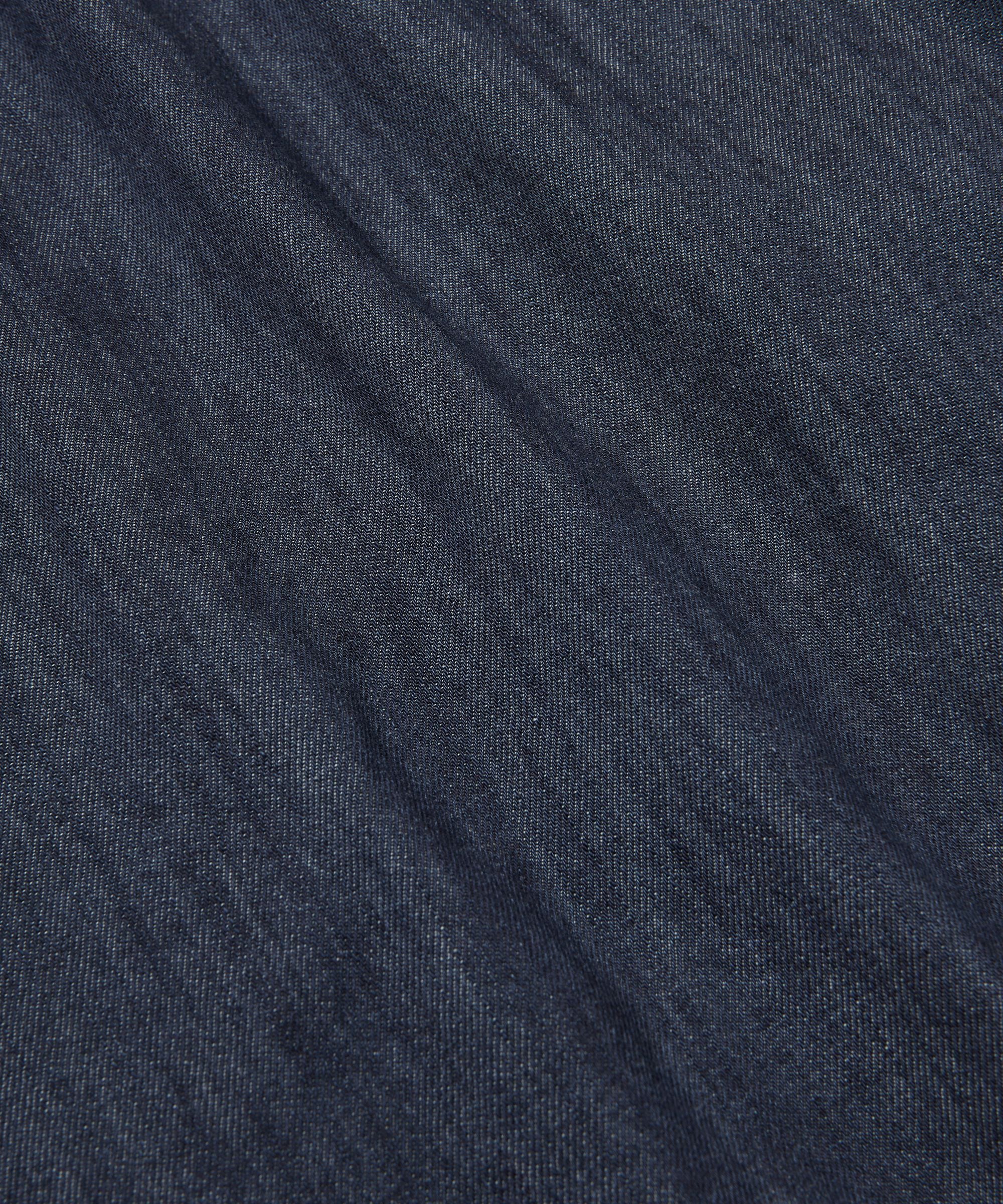 Close-up of dark blue fabric texture