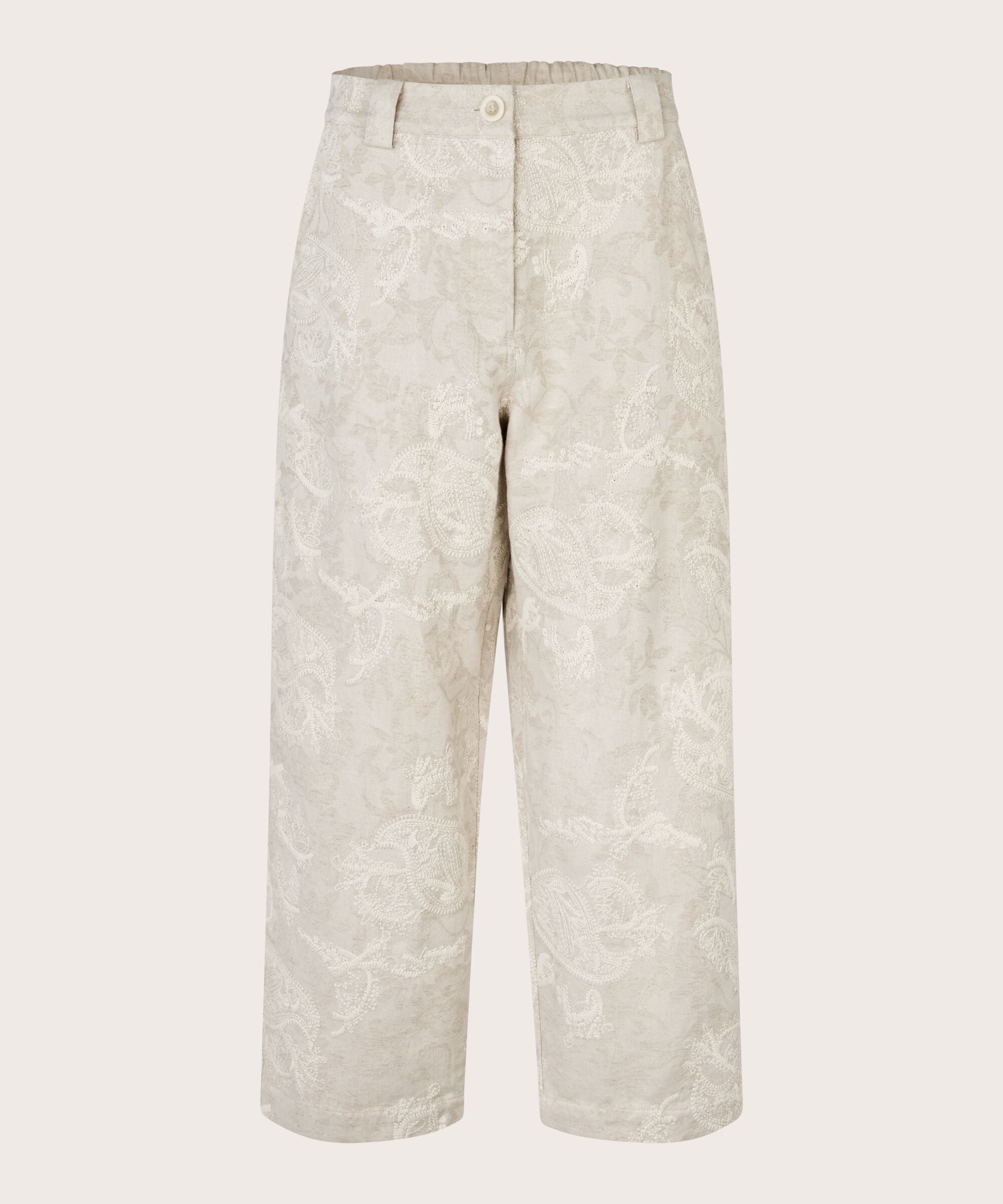 Light beige pants on a white background