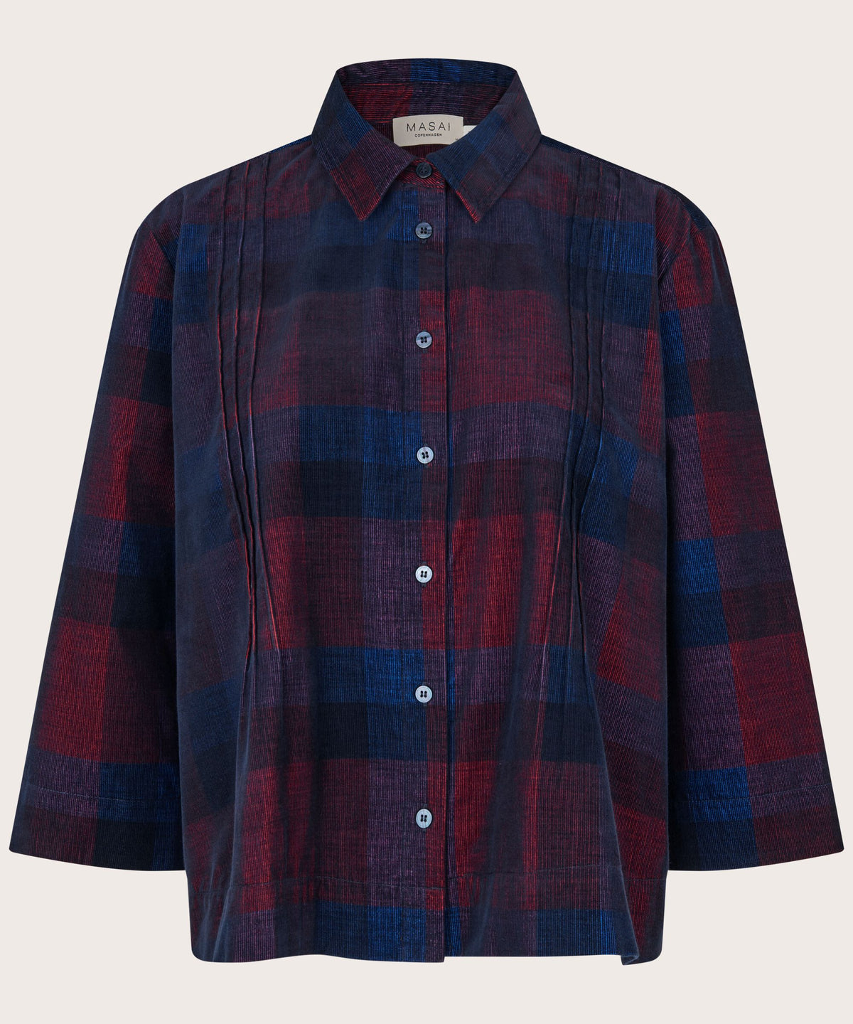 A long-sleeve button-up shirt by Malai, featuring a textured plaid pattern in deep navy blue and burgundy red, with vertical pleat detailing on the front. The shirt is displayed flat against a light beige background.