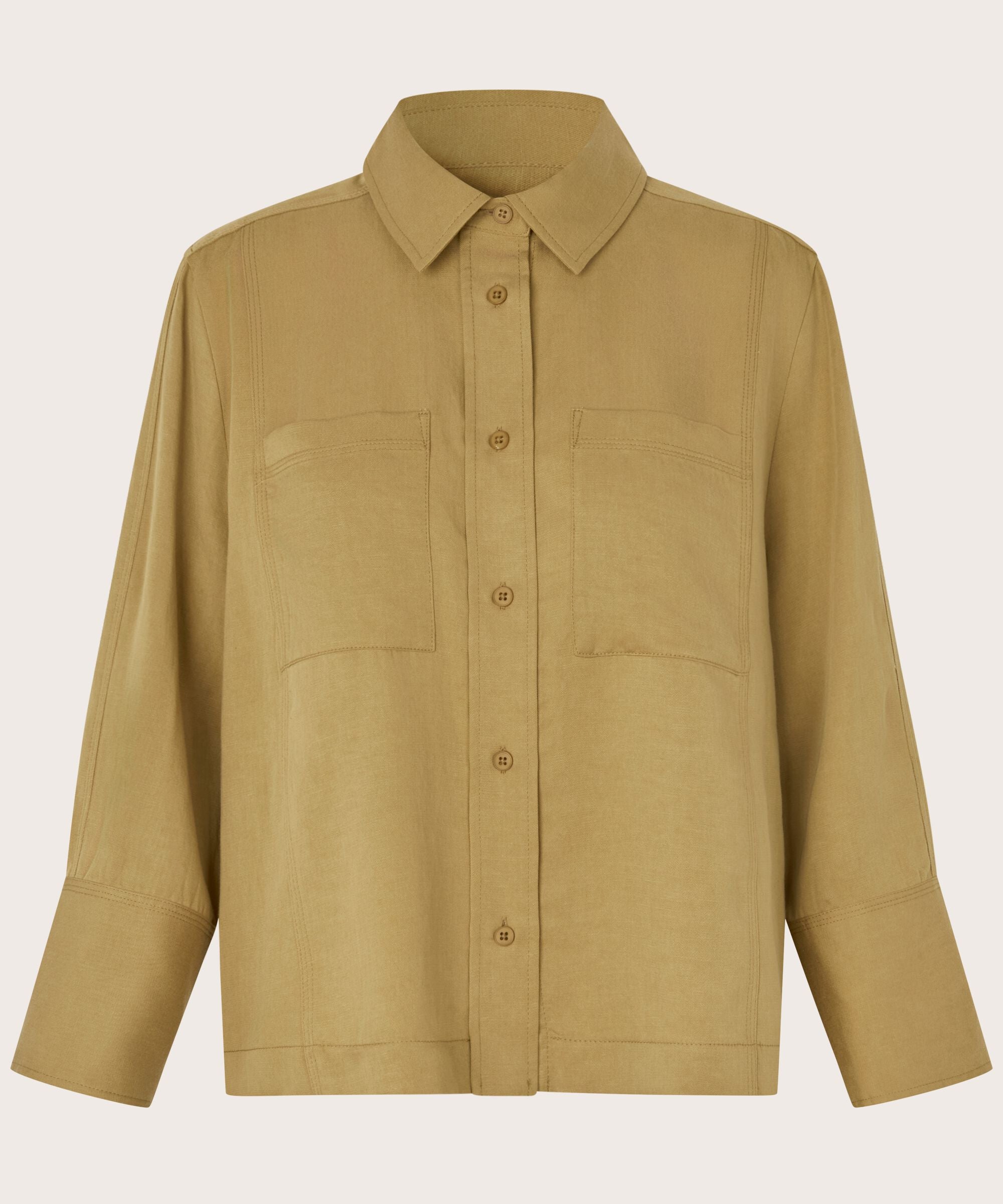 A tan long-sleeve button-up shirt jacket with a pointed collar, two chest flap pockets, and buttoned cuffs, shown against a light gray background.
