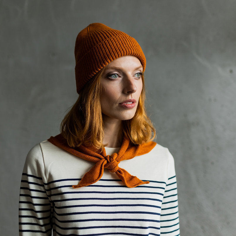 Ribbed orange beanie.