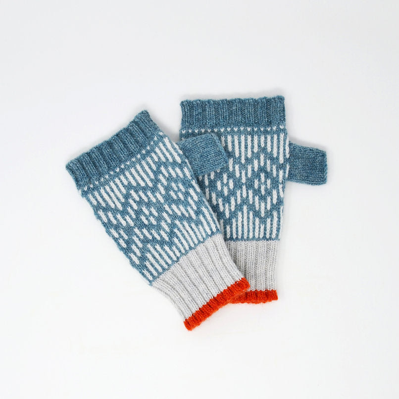Pair of teal and grey fingerless gloves with a white geometric pattern and orange cuffs.