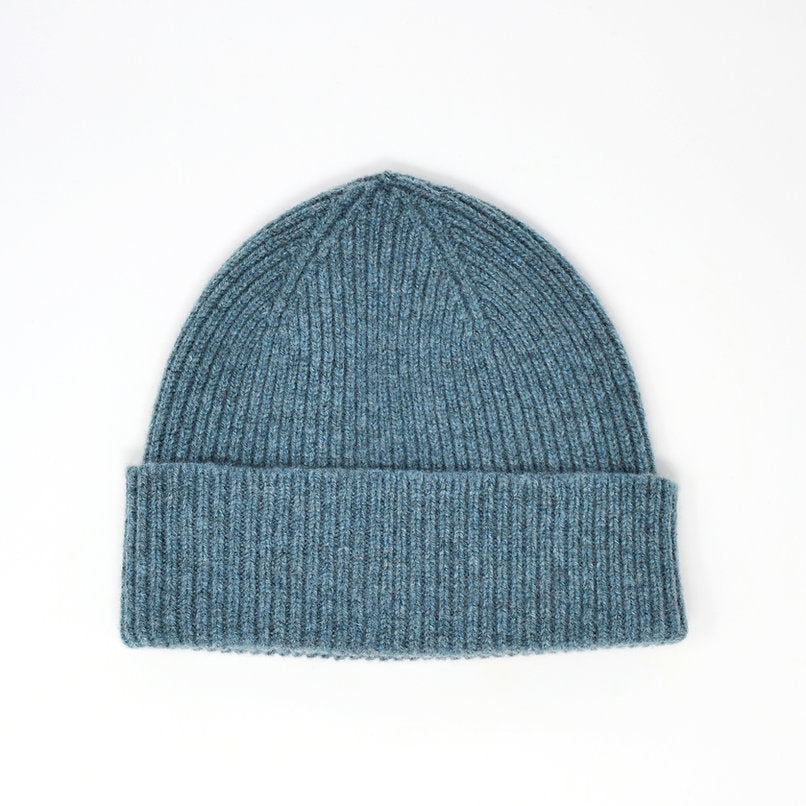 Blue ribbed knit beanie.