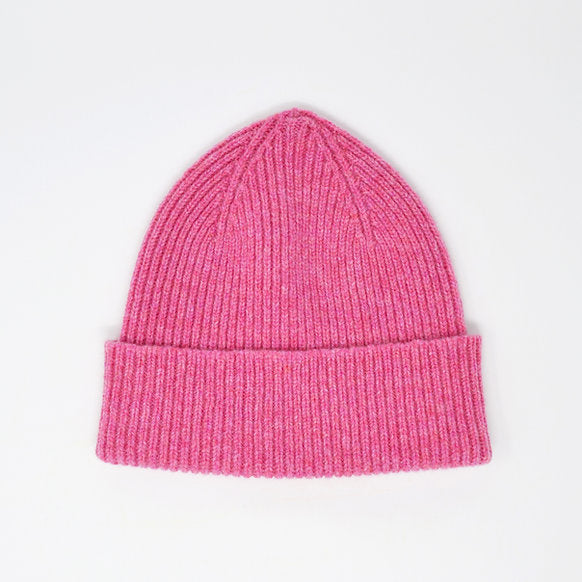 Pink ribbed knit beanie.