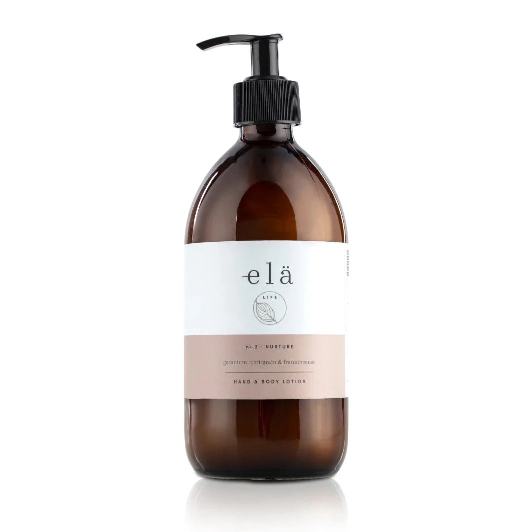 Amber glass bottle of elá Life No. 2 Nurture hand & body lotion with pump dispenser.