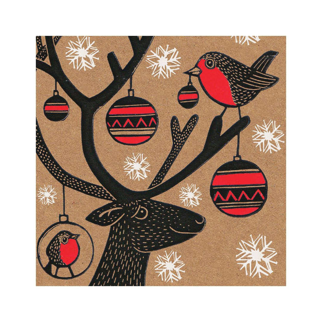 Card with a reindeer, robin, and Christmas baubles on a brown background