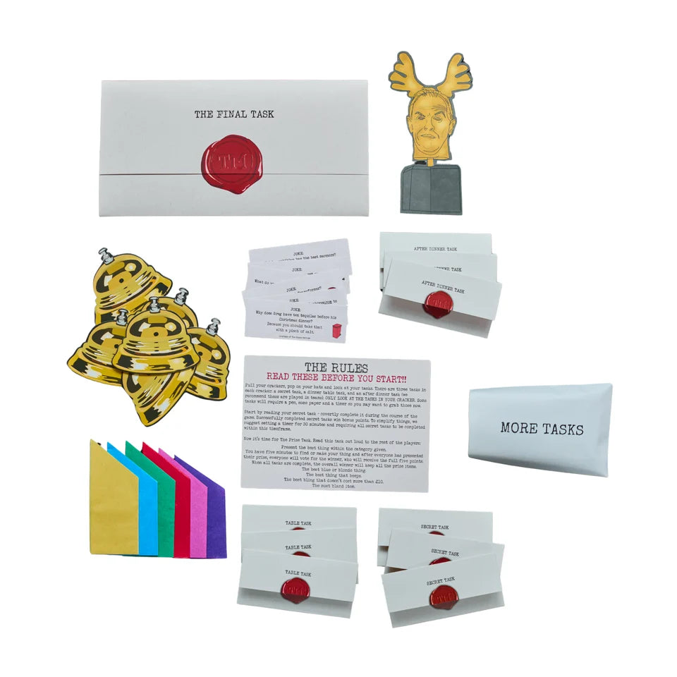 A set of Halloween-themed task cards and accessories, including a white envelope with a red wax seal, a golden reindeer bust, a stack of gold-tie-dyed task cards, a colorful stack of paper tabs, and several white task cards with red wax seals.