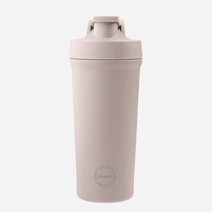 Beige tumbler with a brand logo on a white background