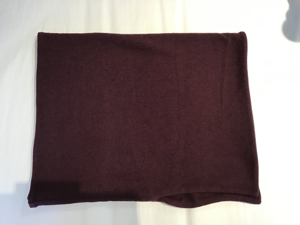 Dark burgundy rectangular knit fabric swatch.  Soft, textured surface.  Folded neatly.