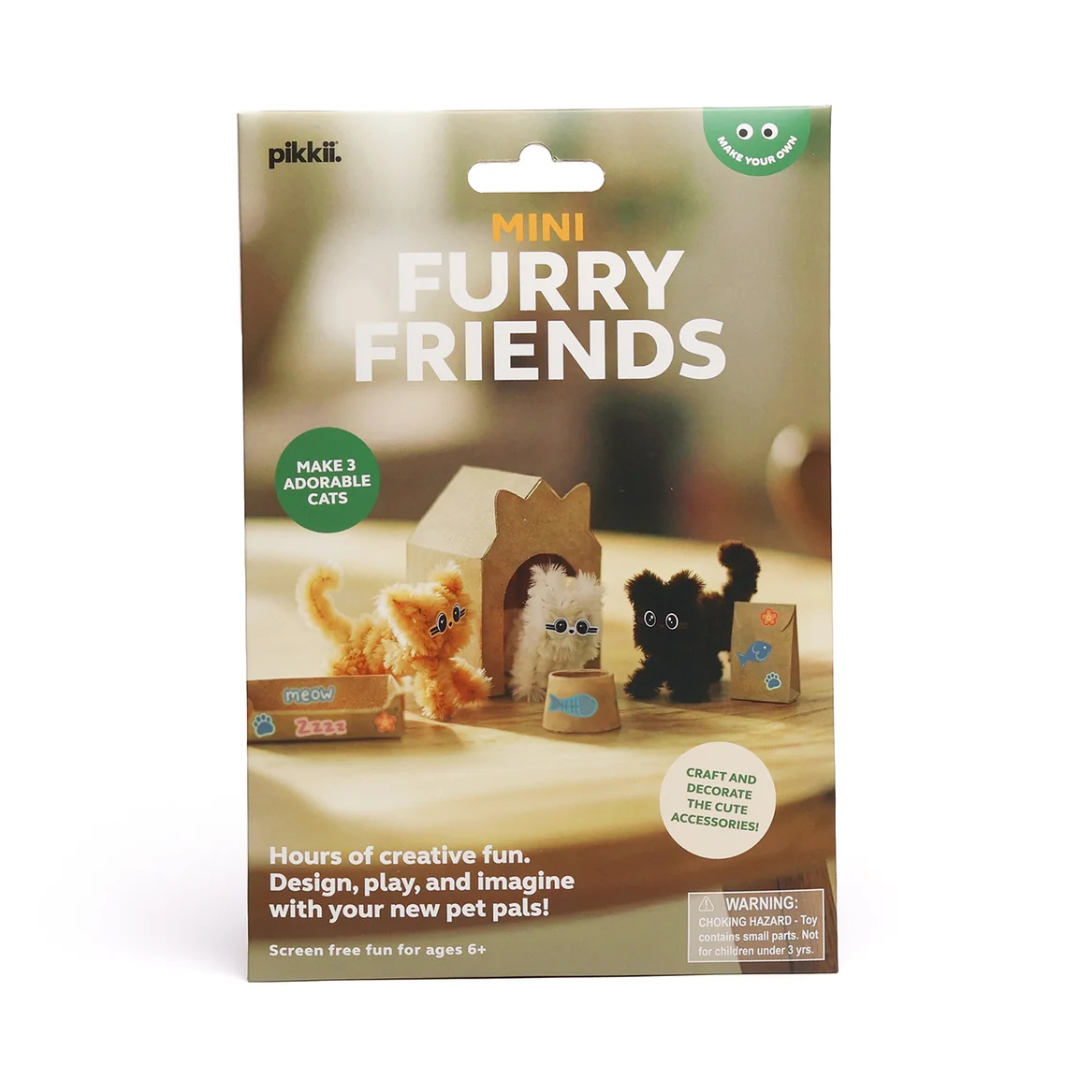 Pikkli Mini Furry Friends craft kit packaging, featuring a cardboard box with illustrations of a fluffy orange cat, a white cat in a house, and a black cat, set against a clean white background.