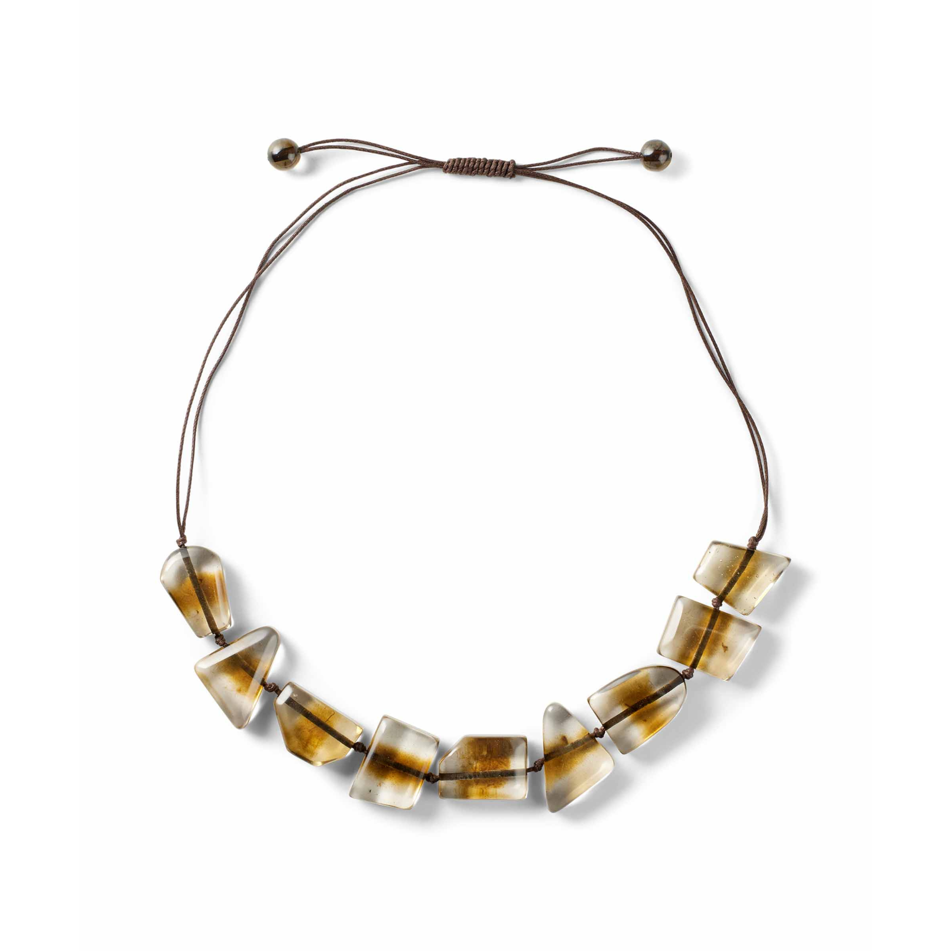 Necklace with brown and beige beads on a white background
