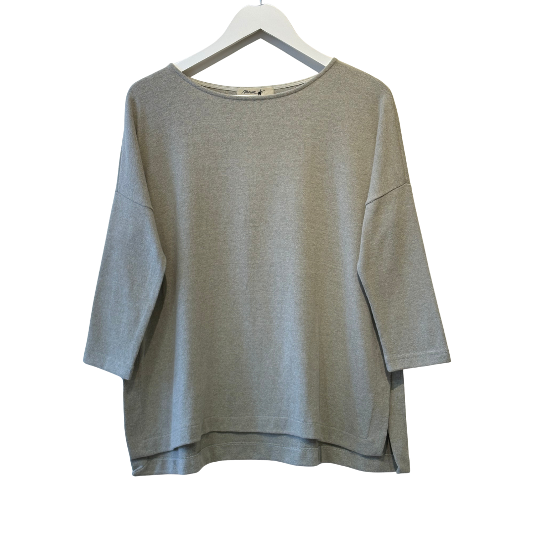 Gray sweater on a white hanger against a white background
