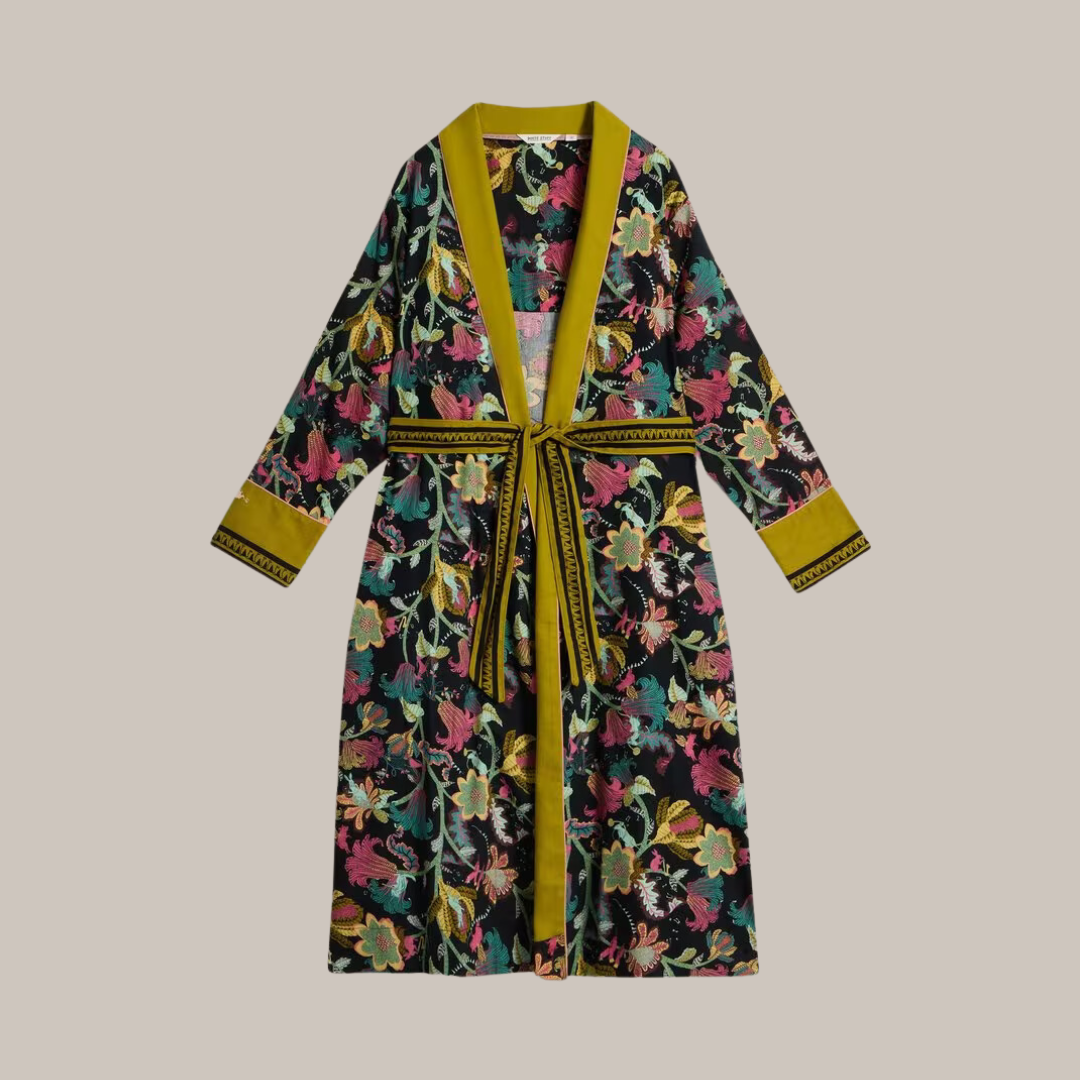 Floral-print kimono-style robe with long sleeves, a self-tie belt, and mustard yellow collar and inner lining.