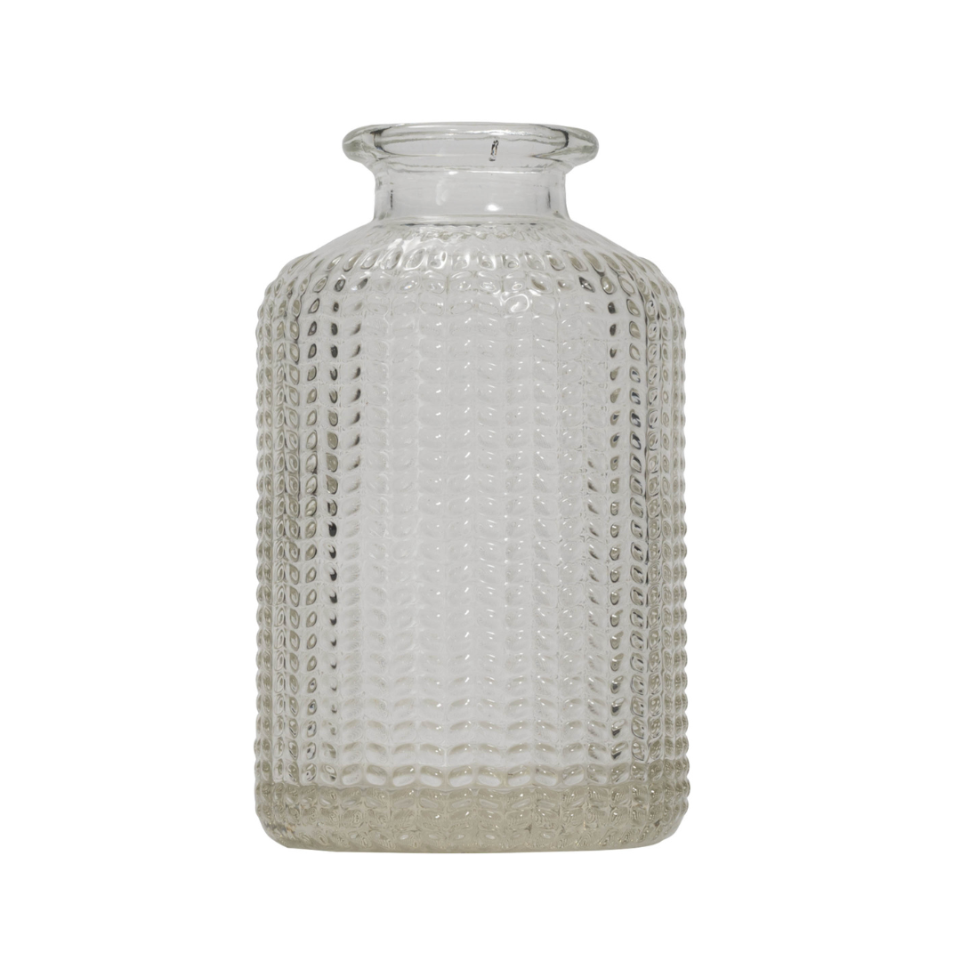 Clear glass vase with a textured, slightly raised, dotted pattern.
