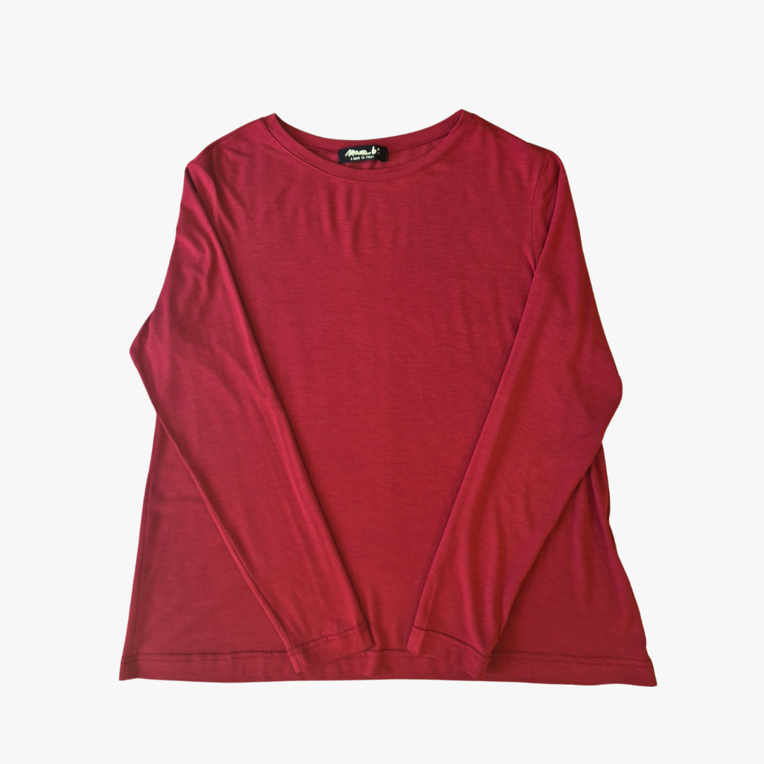 A long-sleeve crewneck shirt in a deep red color, laid flat against a light gray background.