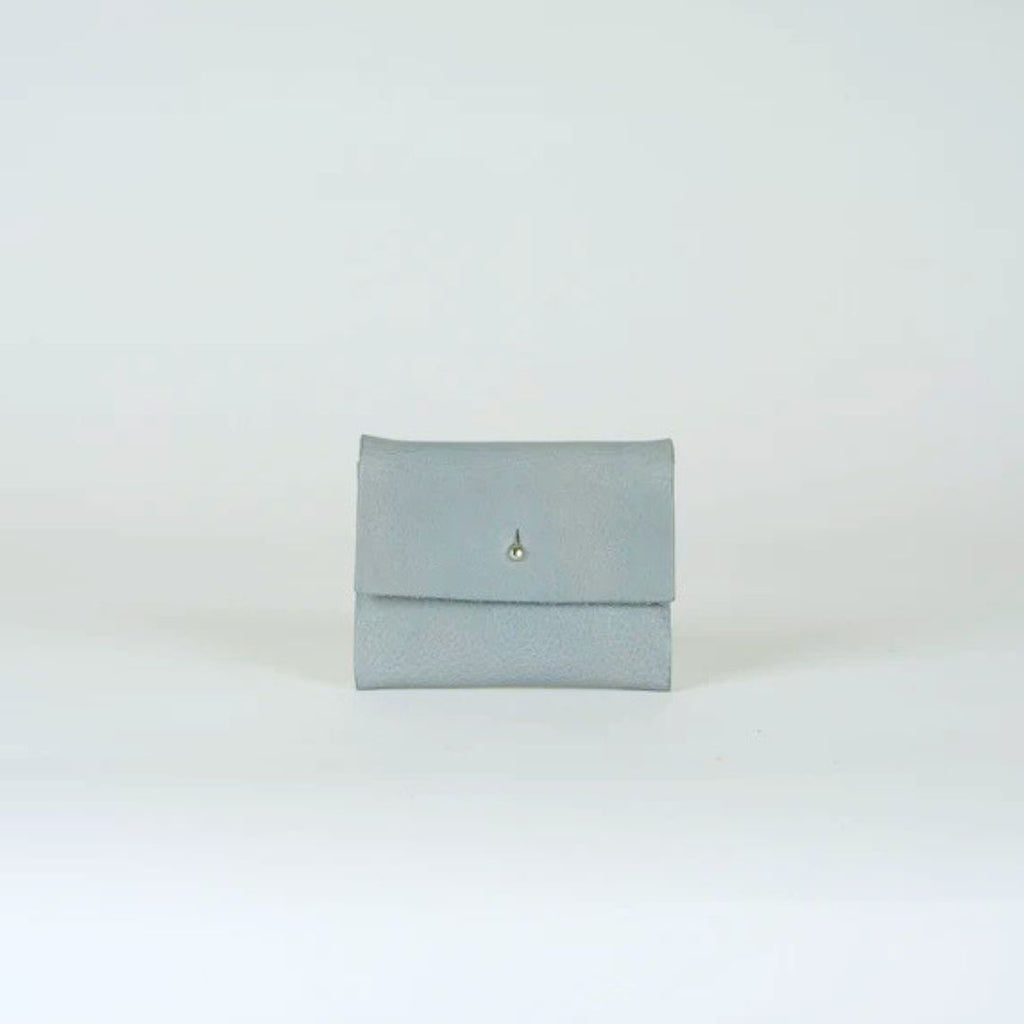 Light gray leather bifold wallet with a small metal stud closure.