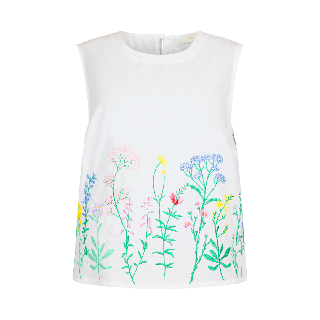White sleeveless top with colorful floral patterns on a white background