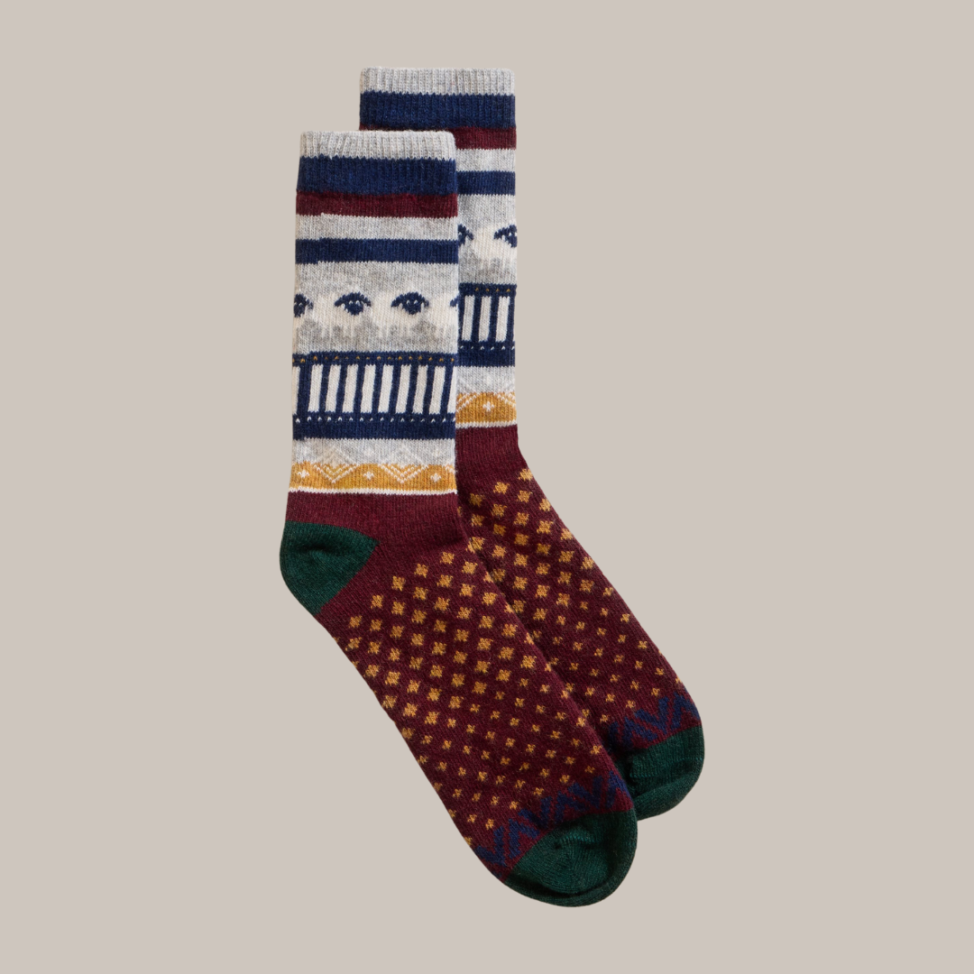 Pair of wool socks with maroon, gold, grey, and navy patterned design.