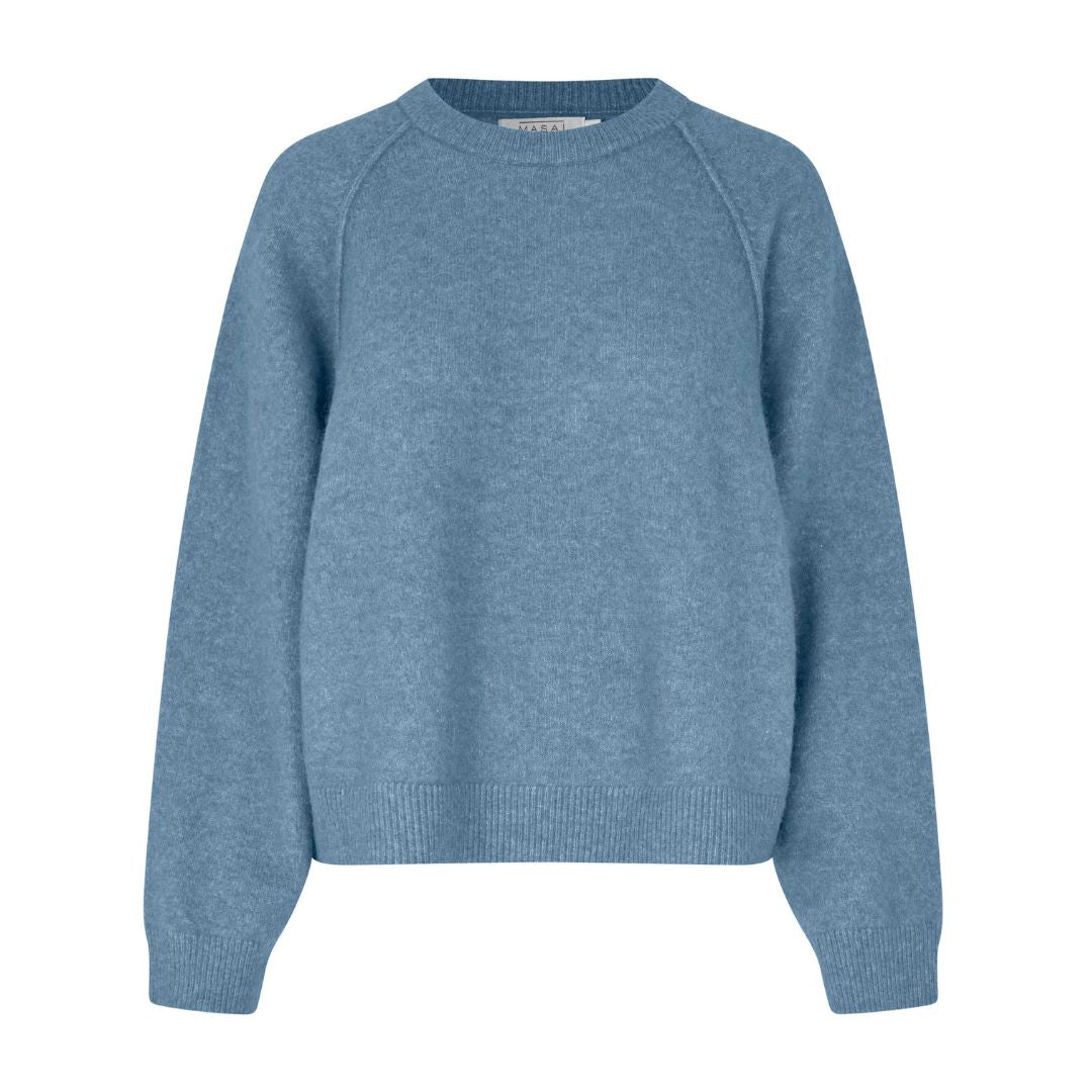 Blue sweater on a white background