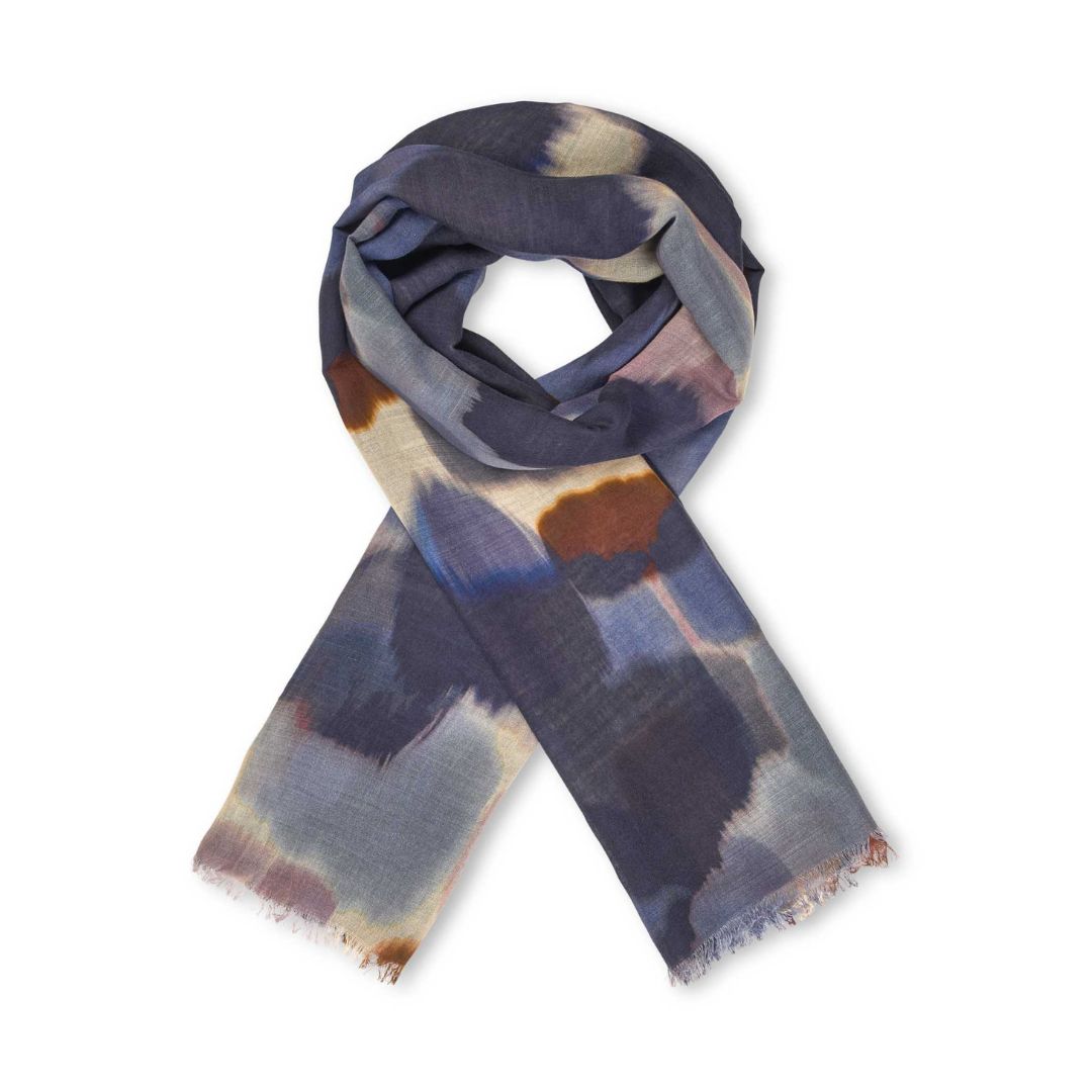 Multicolored scarf with a tie-dye pattern on a white background