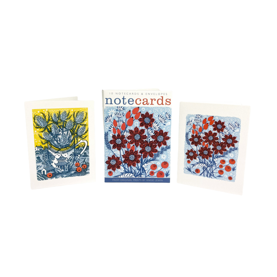 Set of 10 floral notecards and envelopes.  Designs feature red and blue flowers in a folk art style.