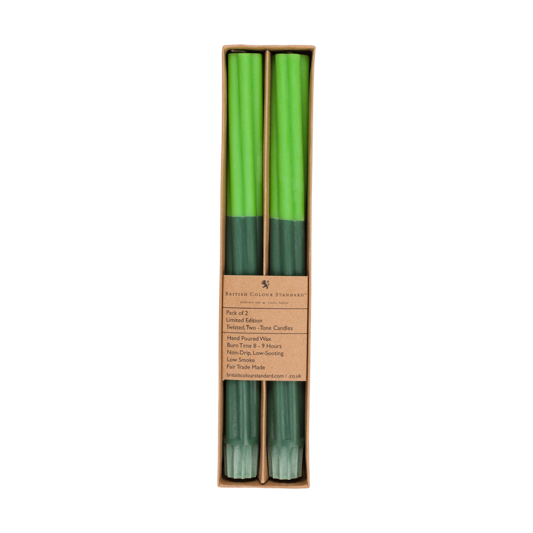 Pair of green, twisted, two-tone candles in a box.  Limited edition, hand-poured wax, 8-9 hour burn time.
