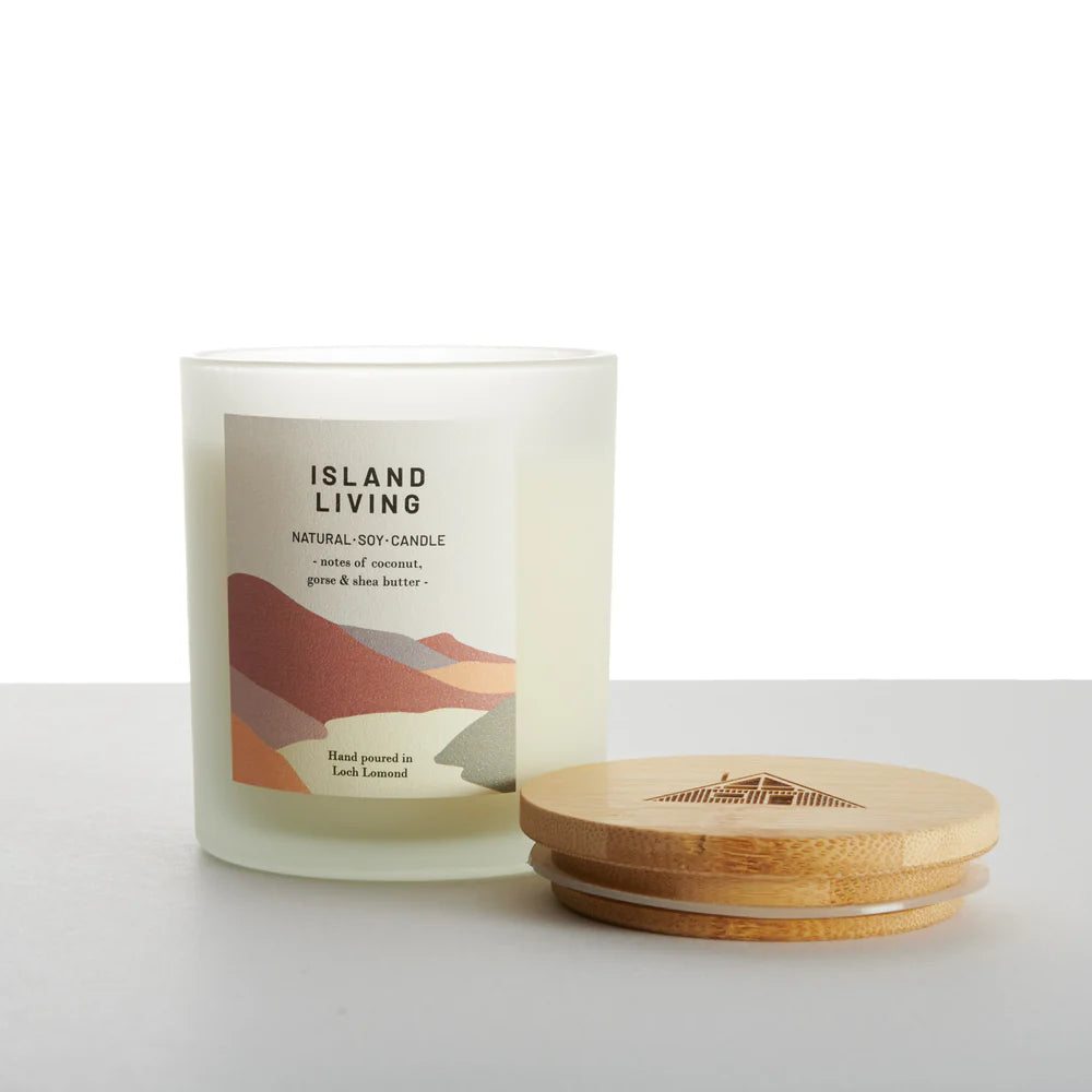 Frosted glass Island Living natural soy candle with coconut, gorse & shea butter scent; bamboo lid.