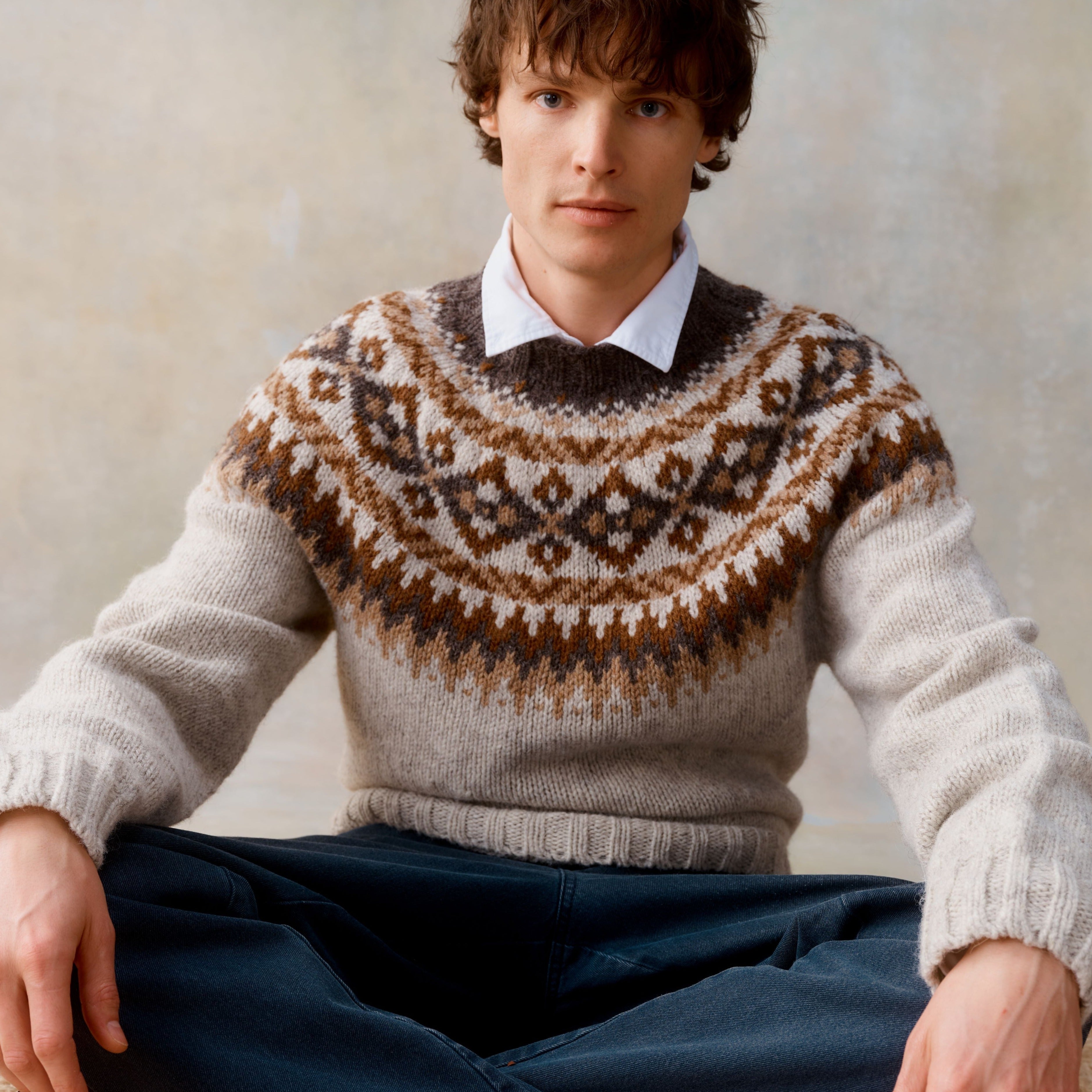 Cream-colored wool sweater with brown and gray Fair Isle yoke pattern.