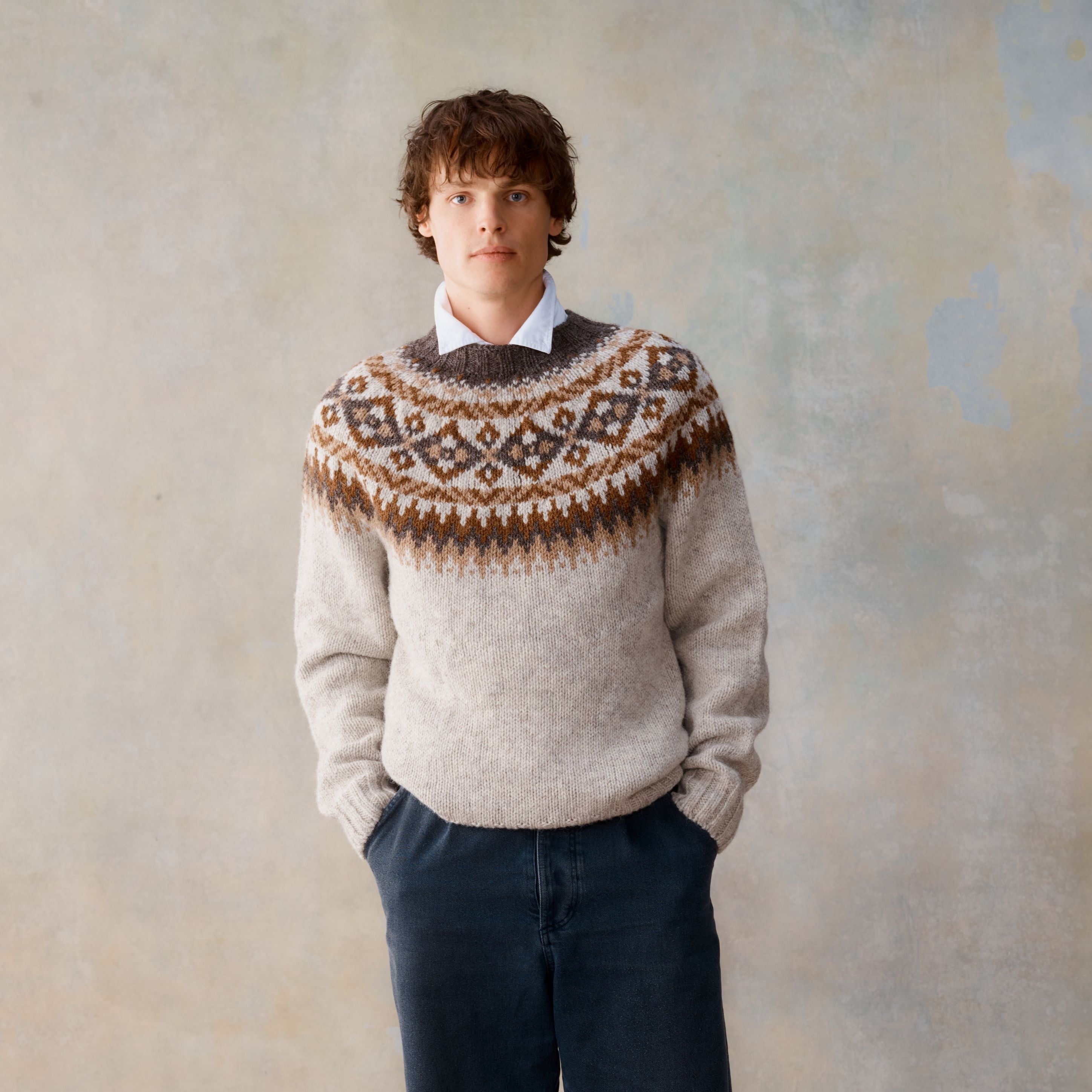 Light beige wool sweater with brown and gray Fair Isle yoke pattern.