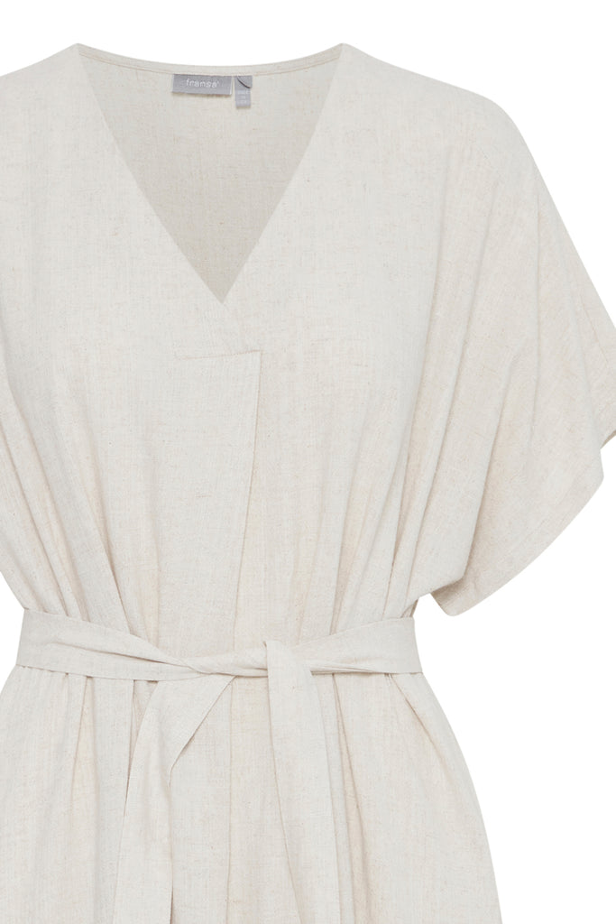 Cream-colored dress by Fransa with a V-neck, short sleeves, and a belted waist.