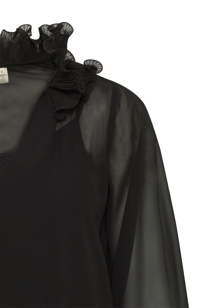 Black Fransa blouse with ruffled collar and sheer sleeves, showcasing elegant and flowing design details.